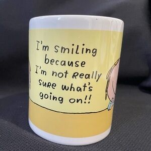 The Leanin Tree Novelty Coffee Mug "I'm Smiling Because I'm Really Not Sure..."